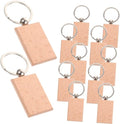 Blank rectangle natural wood keychains with silver split rings, shown in a set of multiple pieces